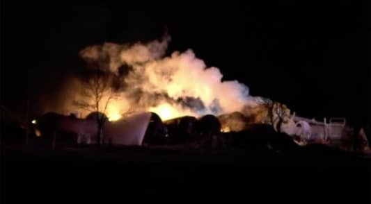 Homes evacuated after train carrying ethanol derails and catches fire in Minnesota