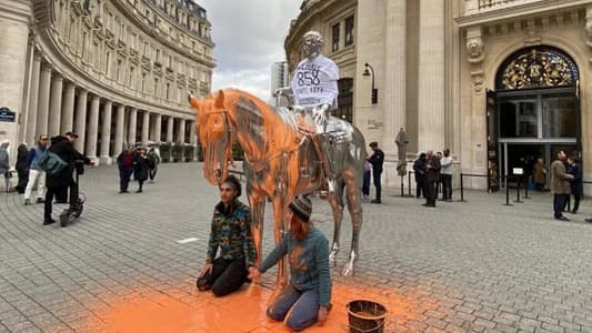 Photos: Climate Activists Pour Paint on Charles Ray Sculpture in Paris