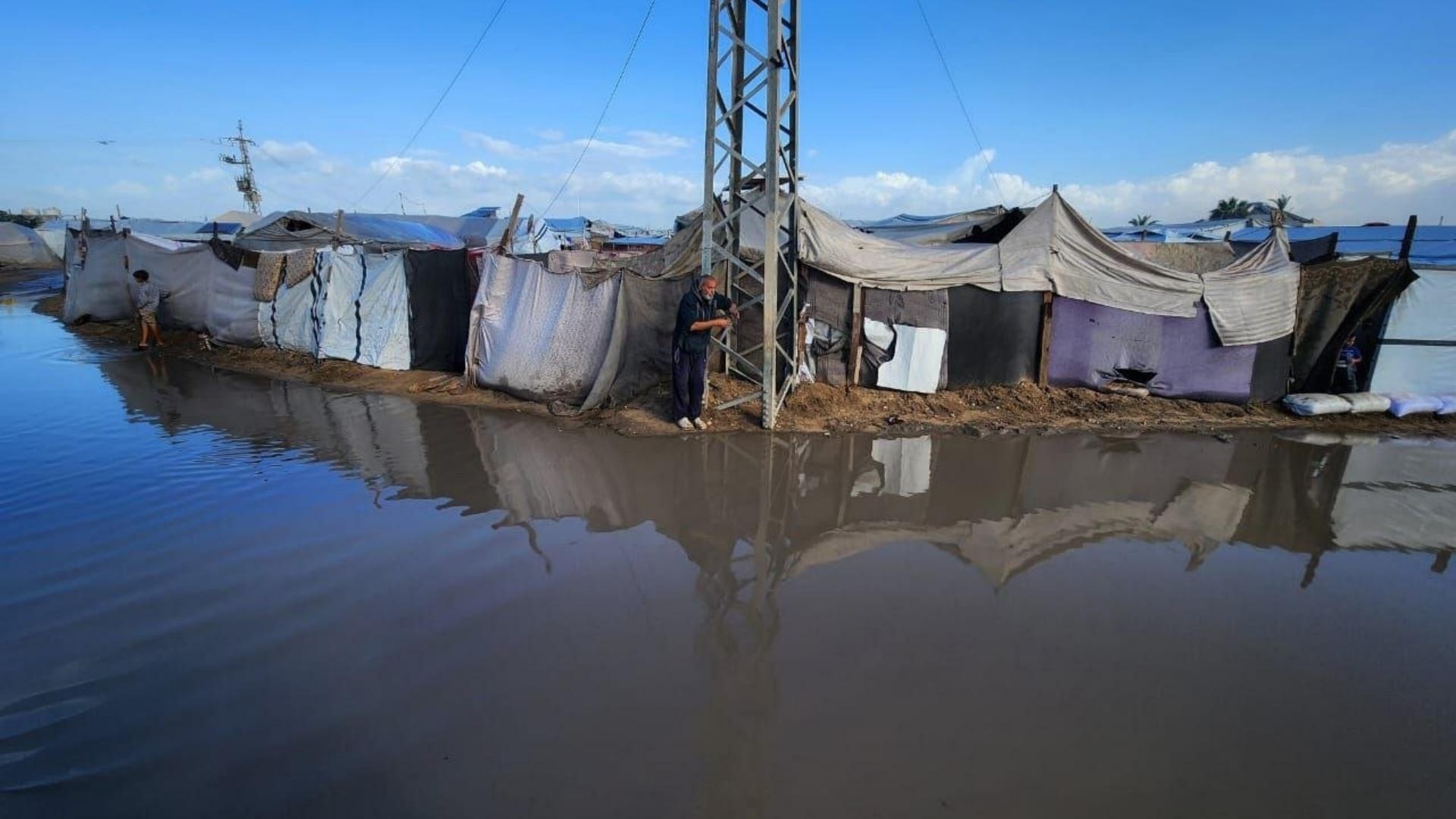 Photos: Storm turns camps into swamps