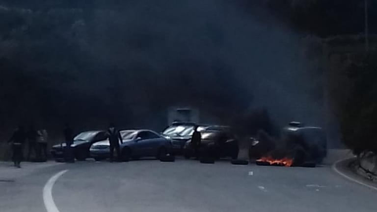 Photo: Protesters block the road in front of Chekka tunnel