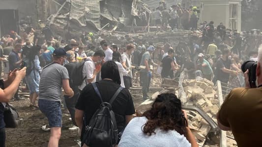 Photos: People Trapped Under Rubble of Children’s Hospital in Kyiv