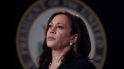 Backed by Biden, Harris moves to lock up White House bid