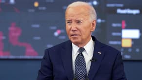 'I am running' Biden says, as he scrambles to reassure Democrats, campaign staff
