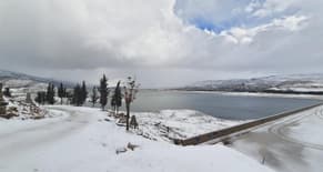 Photos: Snow Covers the Qaroun Dam and Lake