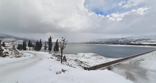 Photos: Snow Covers the Qaroun Dam and Lake