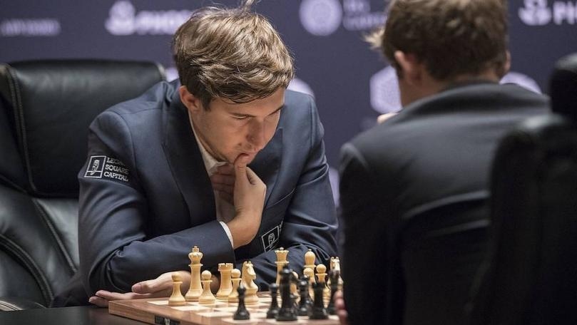 Leading Russian chess grandmaster Sergey Karjakin has been suspended from playing for six months for publicly supporting Russia's invasion of Ukraine, the game's world governing body FIDE announced Monday