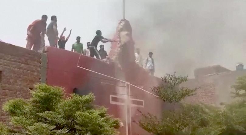 Troops guard Pakistani Christians after mob torches churches