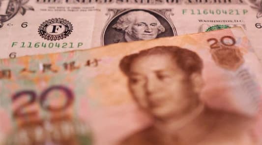 Onshore yuan sinks to 2007 dollar low on China slowdown fears