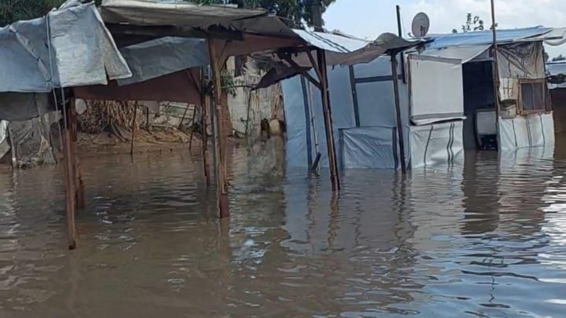 Photos: Storm turns camps into swamps