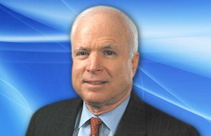 Poker face: McCain plays phone game at Syria debate