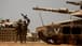 Israeli forces mass on Rafah as US warns of arms halt