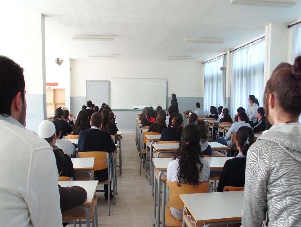 Evening news bulletin: MTV broadcasts footage showing a school principle assaulting students