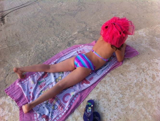 Lying Half-Naked on a Roof, to Save Money