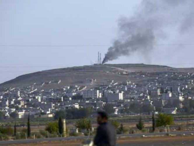 Activists: Kurdish woman leading Kobane battle against IS