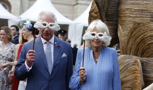 King Charles and Queen Camilla joined conservationists and celebrities donning masks at the Animal Ball in London