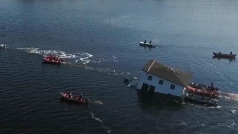 Photos: Canadian Couple Float Their 100-Year-Old Dream House to New Spot Across Bay