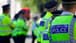 UK police charge three men with helping Hong Kong