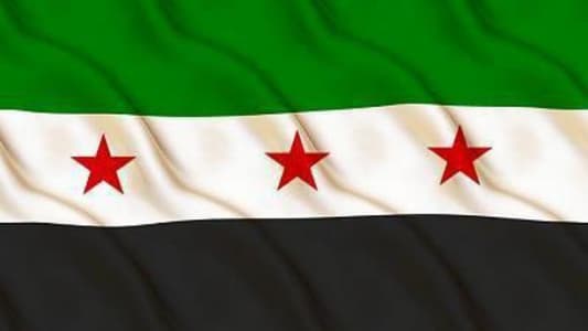 The Syrian flag was raised over the Suwayda Governorate building following reports of an agreement between the Syrian government and the residents and dignitaries of Suwayda