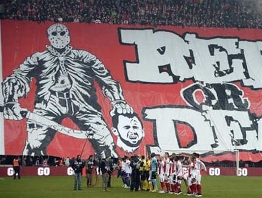 Footage: Belgian Fans Face Ban over Severed Head Banner 
