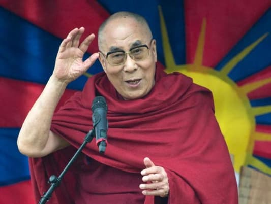 Dalai Lama Rocks Glastonbury Festival