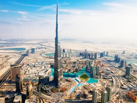 دبي تُضيء برجها بألوان العلم الفرنسي
