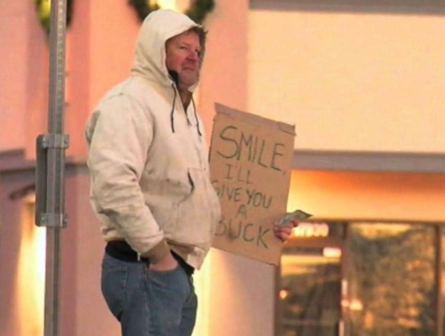Mystery Man Gives Away Cash to Smiling Strangers