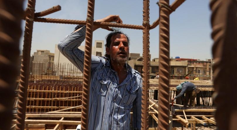 Iraqi builders face growing risks on frontline of climate change
