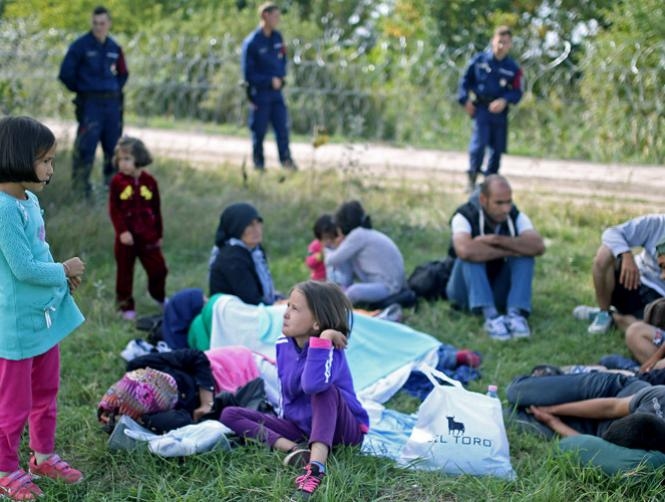 Switzerland Joins Denmark in Seizing Refugees' Assets to Cover Costs