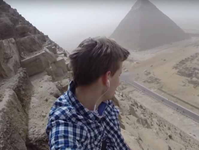 Tourist  Climbs to Top of 4,500-Year-Old Pyramid of Giza
