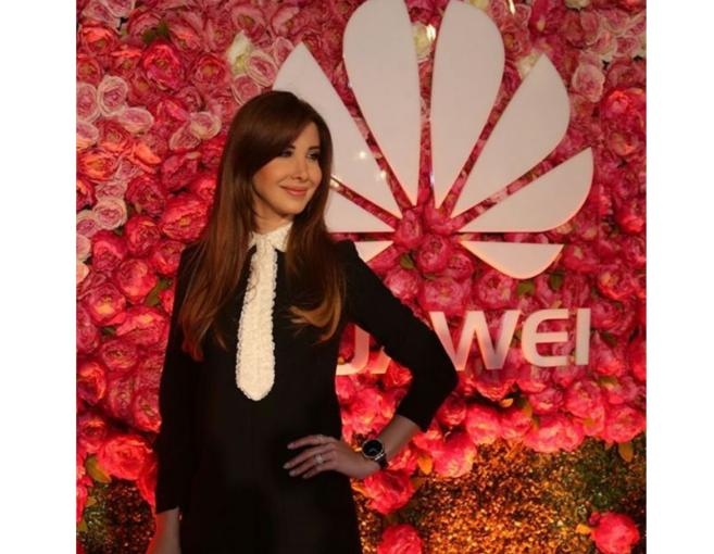 بالصور: إطلالة نانسي عجرم في أسبوع الموضة في دبي