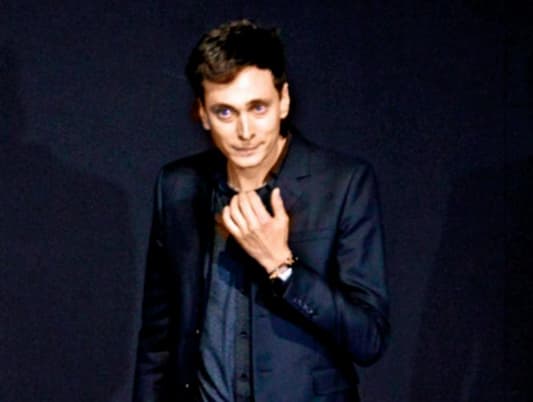 Designer Hedi Slimane to leave Yves Saint Laurent: company