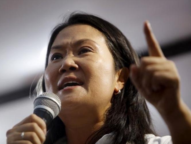 Aide of Peru's Fujimori steps down after money laundering report