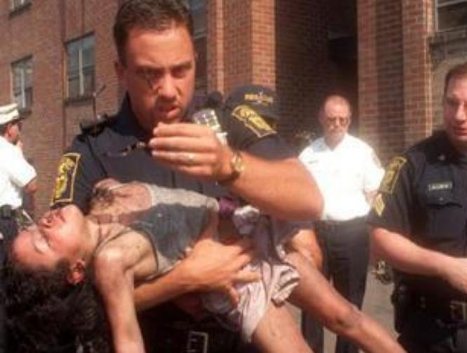 Cop Saves Girl's Life, Attends Her Graduation 2 Decades Later