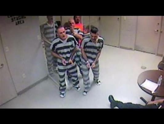 Watch: Prisoners Break Out of Cell to Save Dying Guard