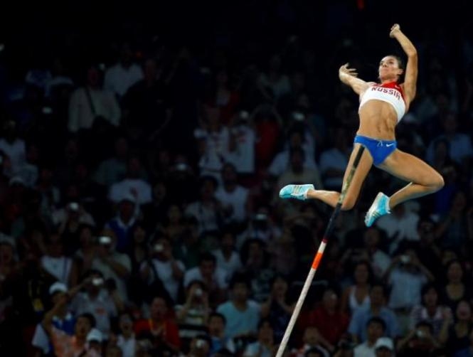 Isinbayeva quits, saying pole vault winner will not earn 'proper gold'