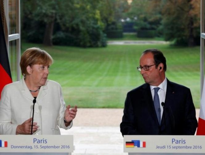 Hollande, Merkel urge clear vision for addressing Europe's weaknesses