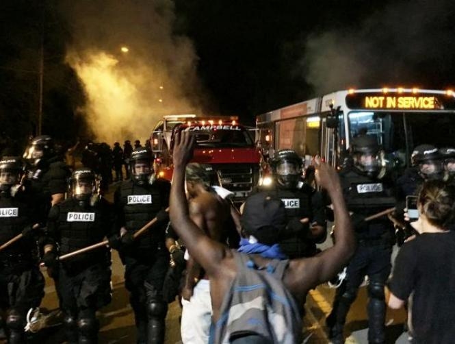 Protest erupts after police kill black man in North Carolina