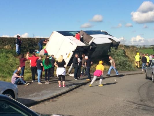 BBC News: 18 injured, including 3 seriously, after bus carrying Rangers FC supporters overturns in East Ayrshire, Scotland