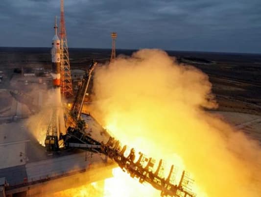 U.S.-Russian crew blasts off for space station