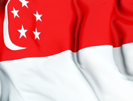 Singapore says foreigners need permit for public assemblies