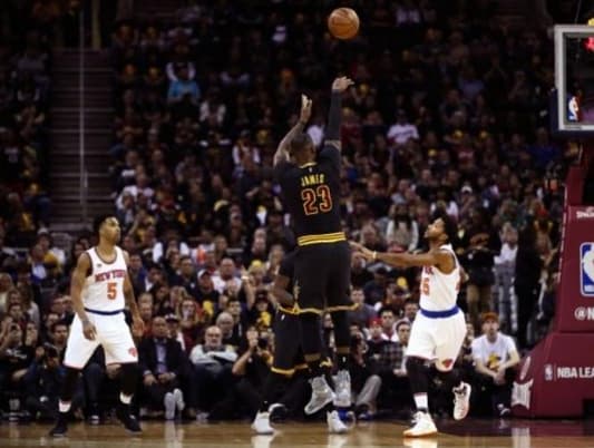 LeBron's triple-double leads Cavaliers romp in season bow