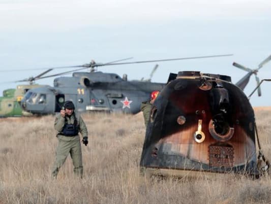 Multinational crew leaves space station, returns to Earth