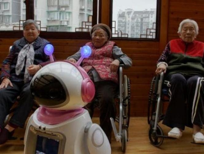 Robots Replace Family Love for China's Lonely Elderly