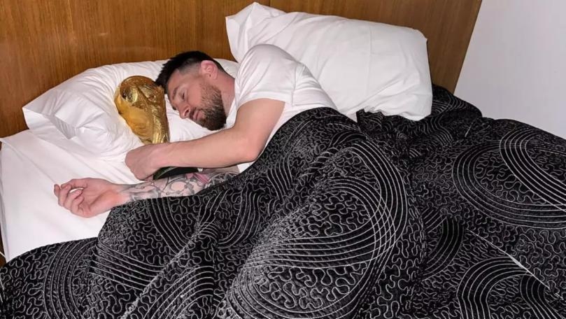 Photos: Messi Sleeping with World Cup Trophy