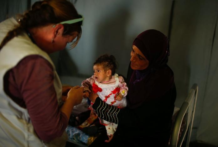 Photos: Babies Starve as War Grinds on in Mosul