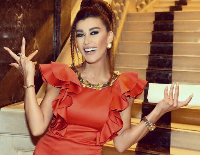 نادين الراسي: "صحتين عقلب اللي نشرت صوري مع رائد"