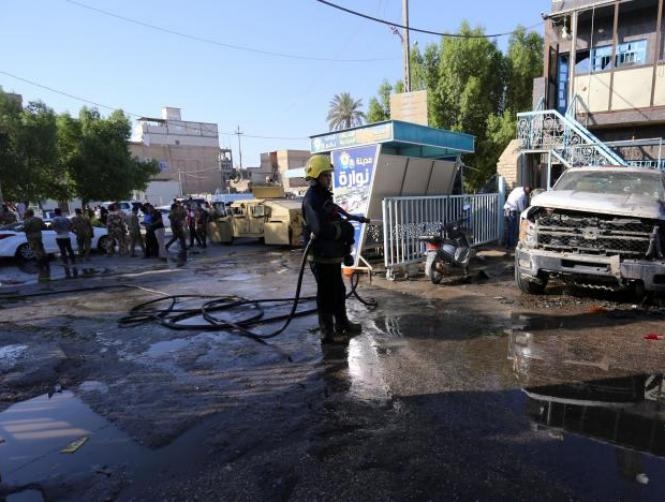 Woman detonates bomb in crowded Friday market in Iraq, killing at least 30