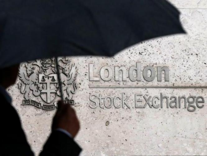 Stocks, dollar ease ahead of slew of central bank speeches