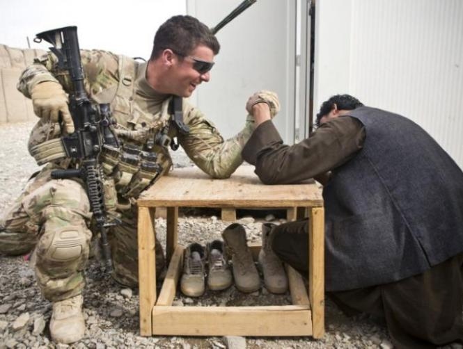 Afghans who helped U.S. forces may get more visas under defense bill