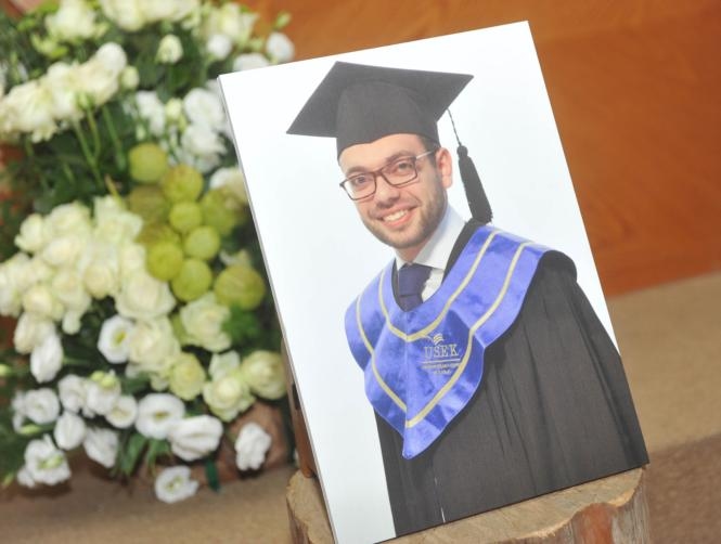 Parents of Roy Hamouche receive their deceased son's diploma